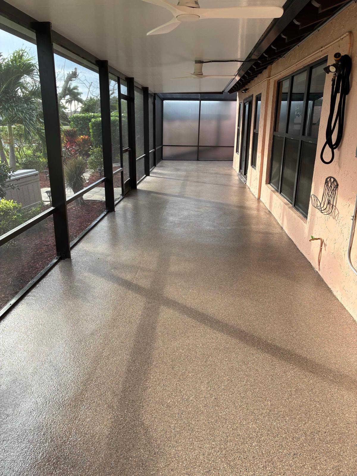 Finished decorative epoxy patio floor coating with flake finish in Fort Lauderdale, FL