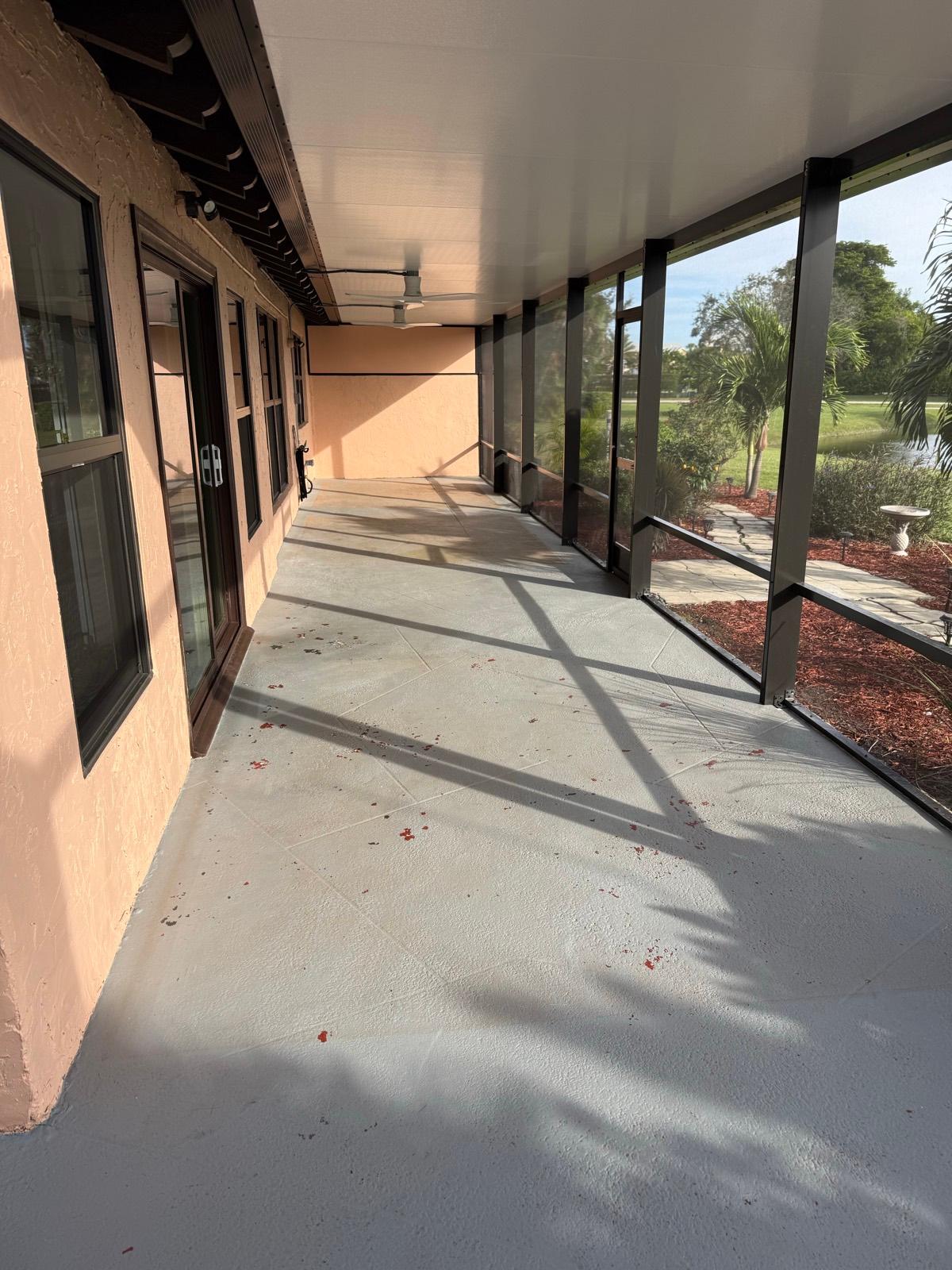 Outdoor epoxy patio floor with slip-resistant finish installed by Resin Masters in Jupiter, FL