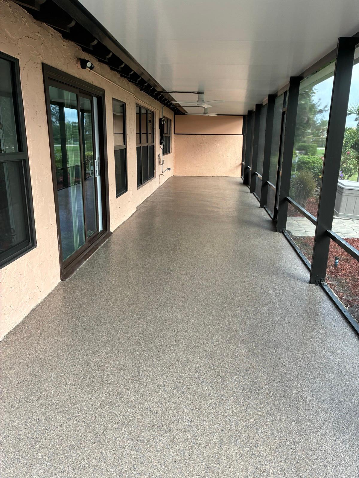 Finished epoxy patio coating for an outdoor living space installed by Resin Masters in Boca Raton, FL